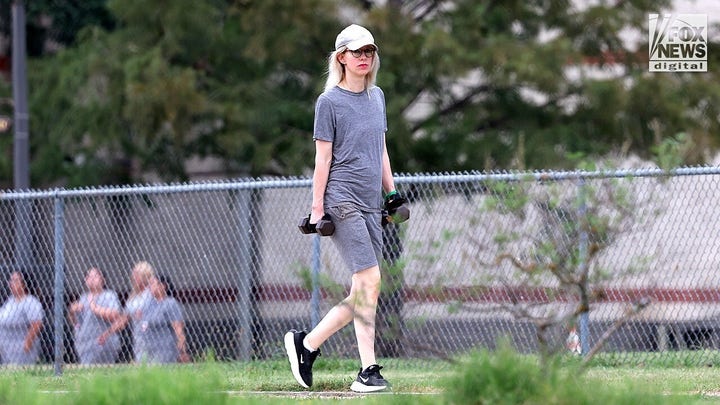 Elizabeth Holmes exercises at Federal Prison Camp Bryan in Texas