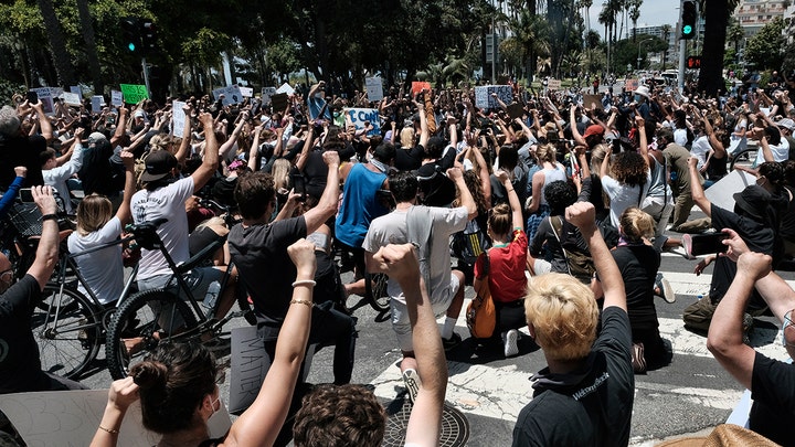 Peaceful protests give way to violence in California cities