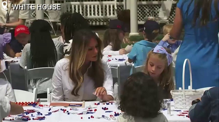 Melania Trump celebrates ‘Take Our Daughters and Sons to Work Day’ by helping kids decorate American flags