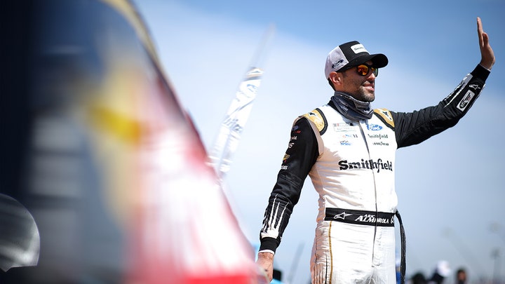 Cuban-American NASCAR star Aric Almirola reminds fans that "our freedom is not free"