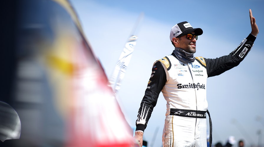 Cuban-American NASCAR star Aric Almirola reminds fans that "our freedom is not free"