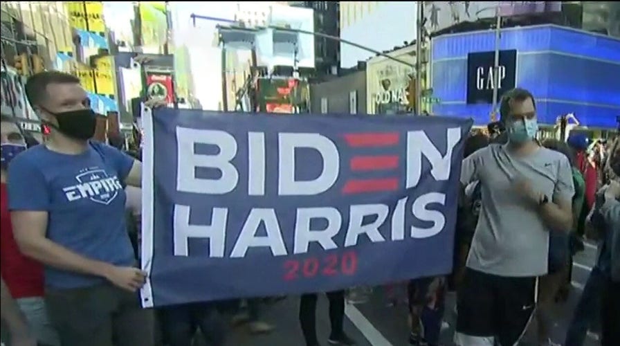 Crowds gather in Times Square after Biden projected to win election