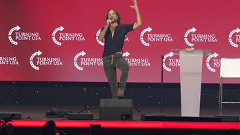 Comedian Russell Brand prays for attendees at Turning Point Summit: 'Salvation is available to you'