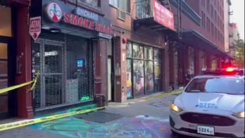 Police respond to Orchard Smoke Shop where an employee was shot after confronting 3 robbers