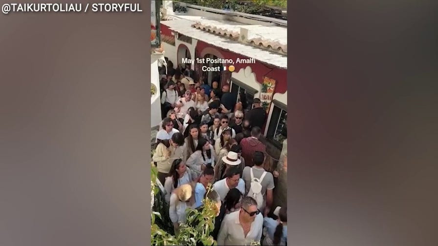 Shoulder-to-shoulder crowds choke narrow walkways along Italy’s Amalfi Coast