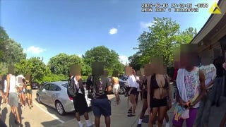 Body camera footage shows a flash mob of teens taking over an Illinois pool