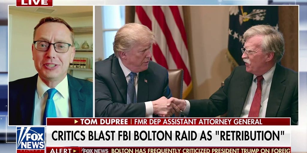 Critics call John Bolton FBI raid 'political retribution'