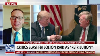Critics call John Bolton FBI raid 'political retribution'
