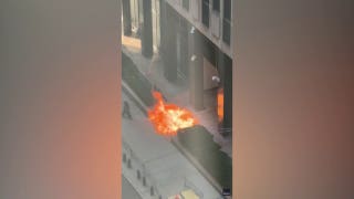 Video shows suspect setting fire outside Manhattan federal building