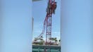 Crane arm falls onto Miami high-rise pool area