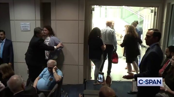 Commerce Secretary Gina Raimondo's talk interrupted by climate change protesters: video