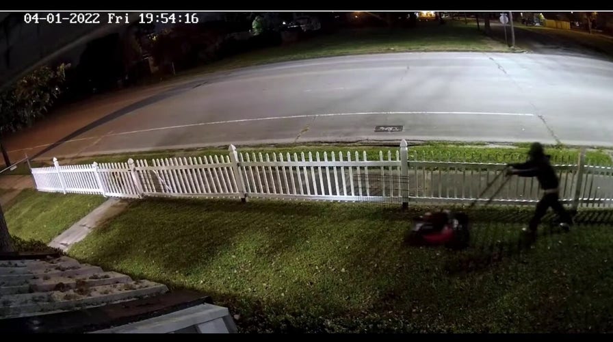 Texas police release video of suspect allegedly burglarizing home, mowing victim's lawn