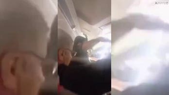 Passengers scream as violent shaking appears to tear apart plane cabin during flight