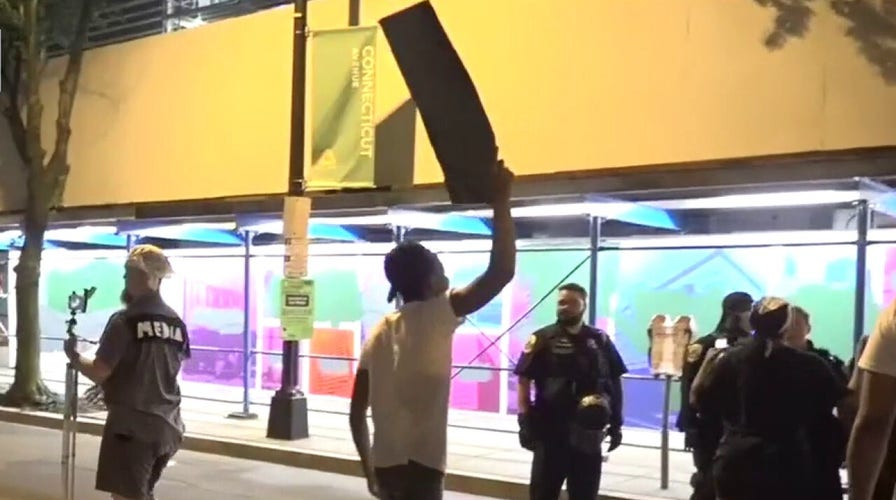 Big cities grapple with ramifications of calls to 'defund the police'	