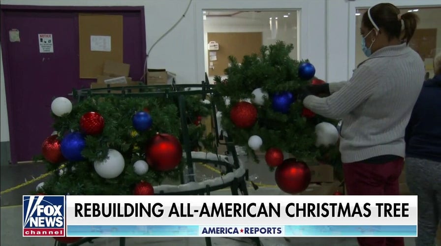 The rebuilding of 91����' All-American Christmas Tree begins