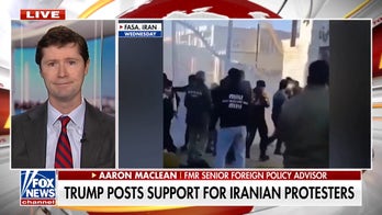 Trump warns Iran after deadly protests: 'Locked and loaded'