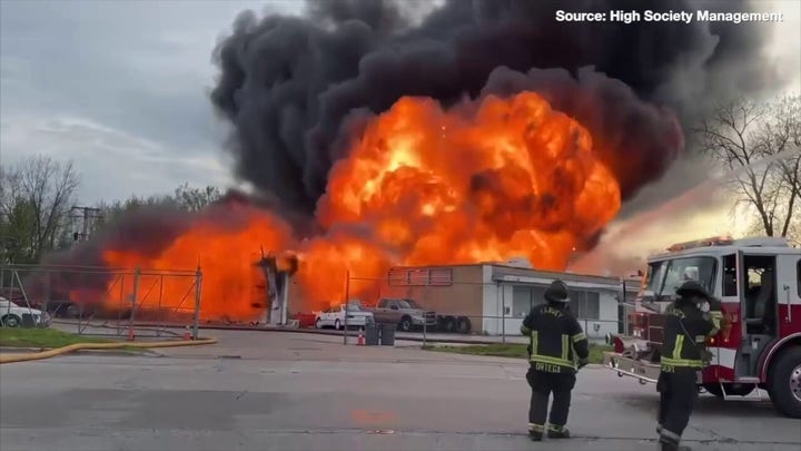 A Dolton business went up in flames in what authorities are investigating as a 'suspicious' incident