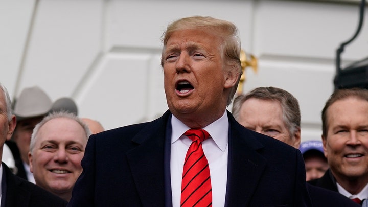 President Trump signs USMCA trade deal as Senate impeachment trial continues