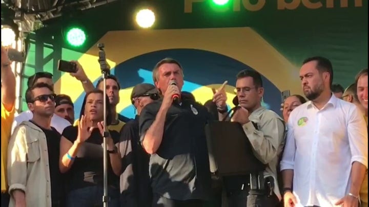 Outgoing Brazilian President Bolsonaro during his final campaign rally on Friday. Bolsonaro lost in Sunday's presidential runoff election to Luis Inacio Lula da Silva in a close race.