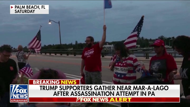 Trump supporters gather near Mar-a-Lago after rally shooting