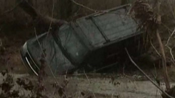Chilling 911 call released of SUV swept away by floodwaters