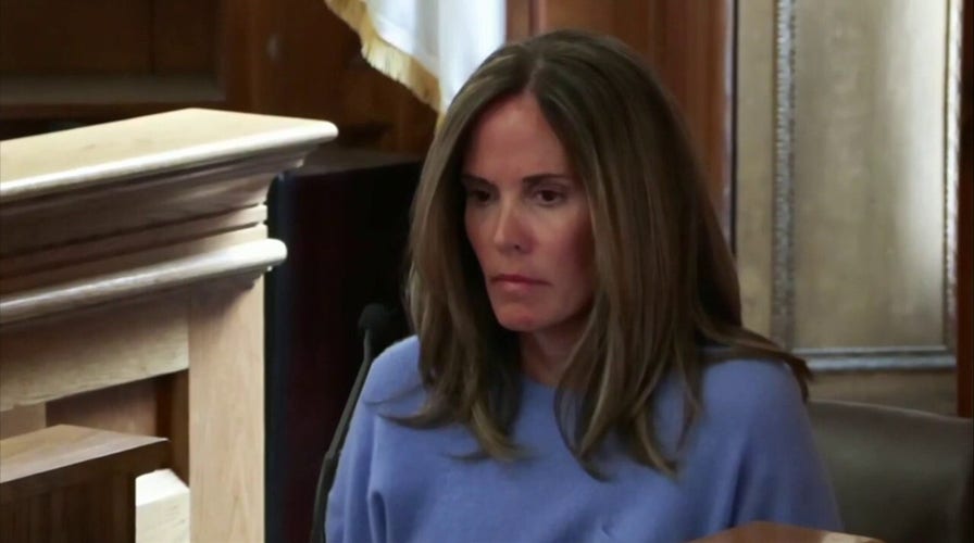 Jennifer McCabe listens to 911 call during testimony in Karen Read's trial