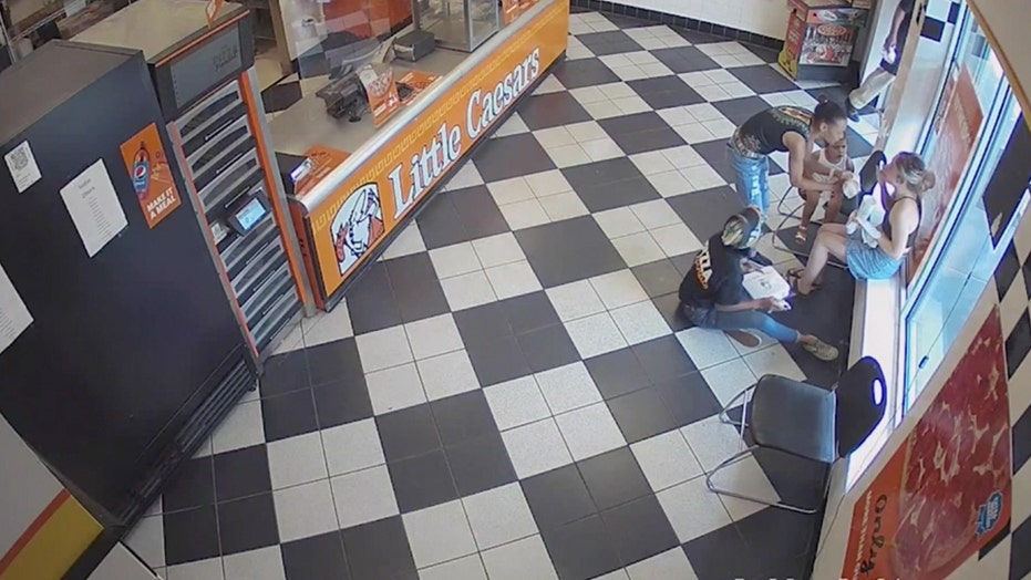 woman wanted in Little Caesars attack remains at large, sheriff
