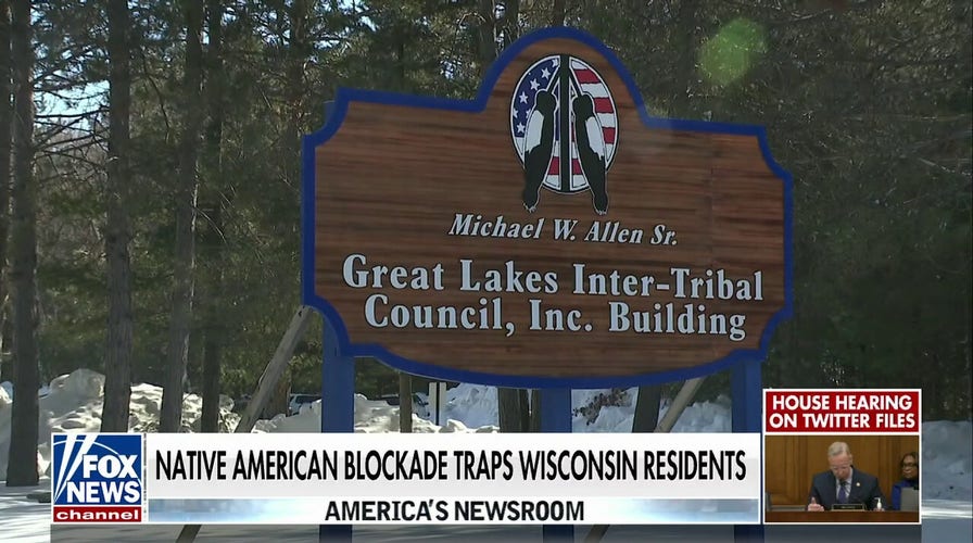 Wisconsin residents trapped in homes as Native American tribe maintains blockade over legal dispute