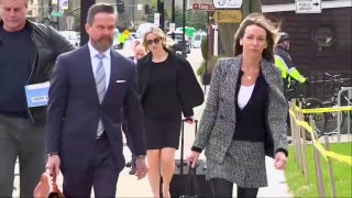 Karen Read arrives for last-minute motions hearing ahead of retrial on murder charges.mp4