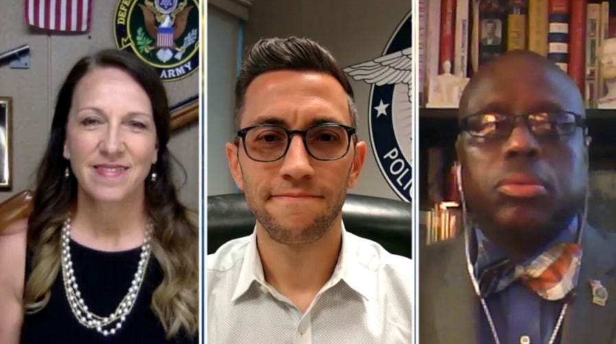 Trump praises law enforcement during Tulsa rally as calls for defunding continue