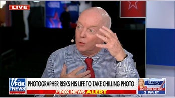 Photographer behind photo of bullet whizzing past Trump speaks out