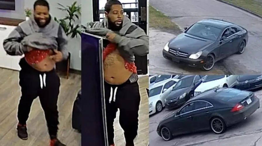 Armed robbery suspect backs out after tables turned at Houston car dealership