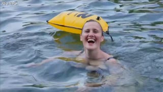 Paris swimmers enjoy dip in Seine River after a century of polluted waters