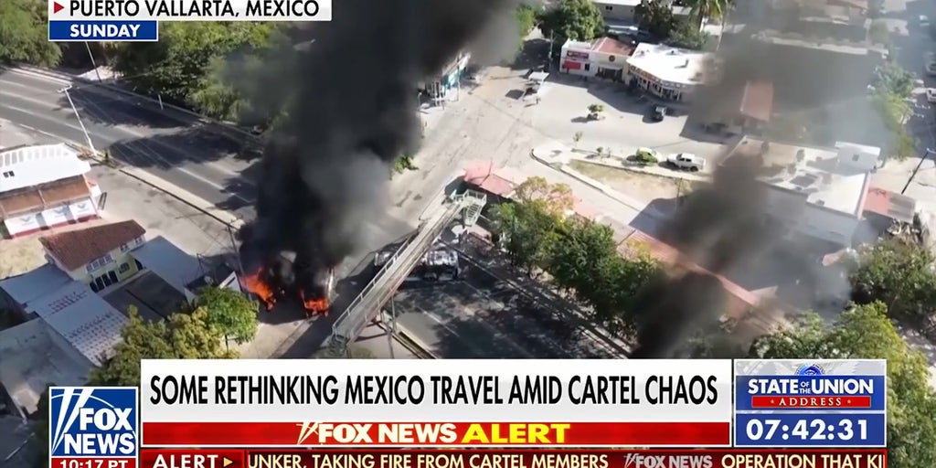Mexico's president insists cartel chaos easing, US officials warn against travel