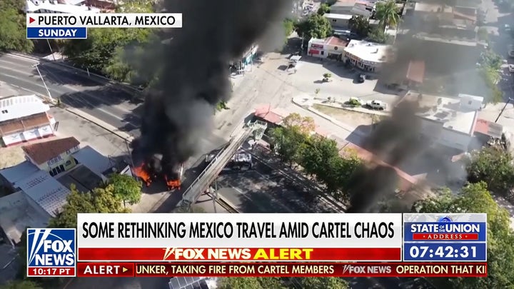 Mexico's president insists cartel chaos easing, US officials warn against travel