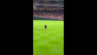 Reds fan runs onto field, does backflip and gets tased - Fox News