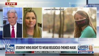 Student wins legal battle over ‘Jesus Loves Me’ mask