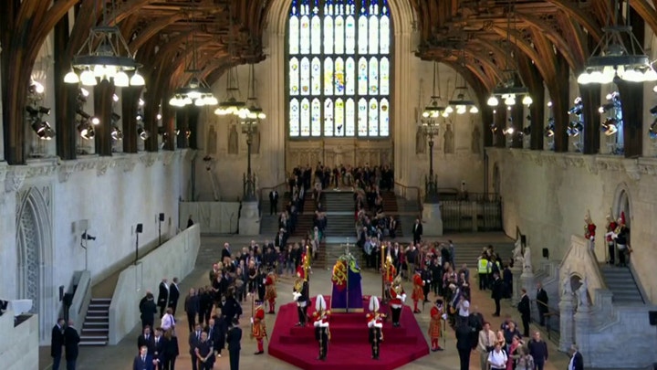 Britons queue for hours to bid farewell to Queen Elizabeth II as she lies in state