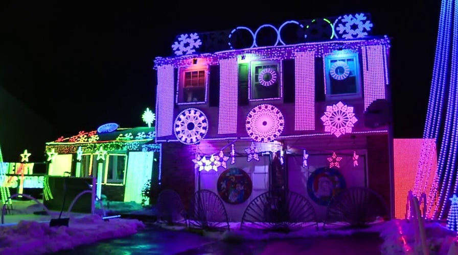 Pennsylvania man views his Christmas display after getting glasses to help color blindness