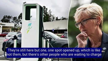 LISTEN: 911 caller complains that Energy Secretary Jennifer Granholm's staff is blocking Georgia electric vehicle charger with gas-powered car in June.