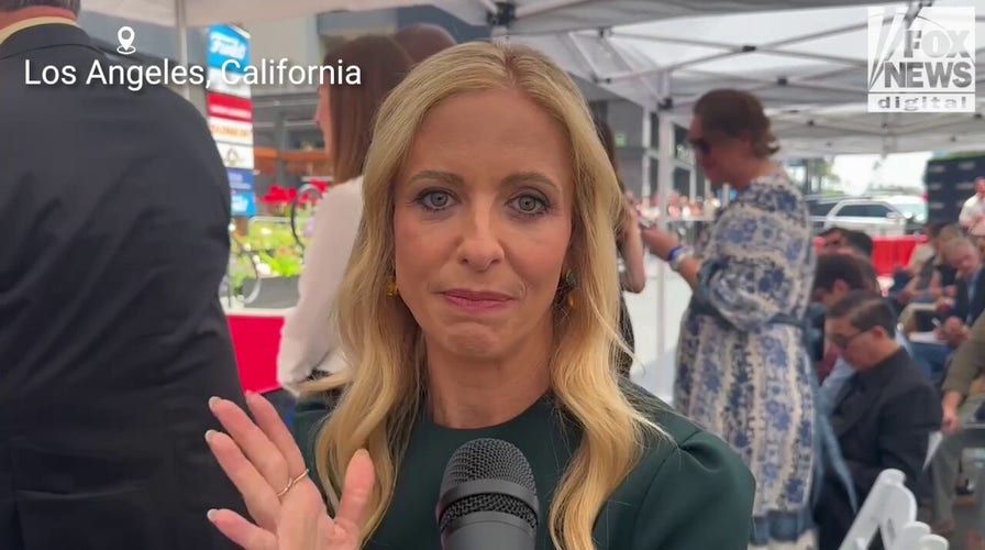 Sarah Michelle Gellar is happy to call Christian Slater a friend