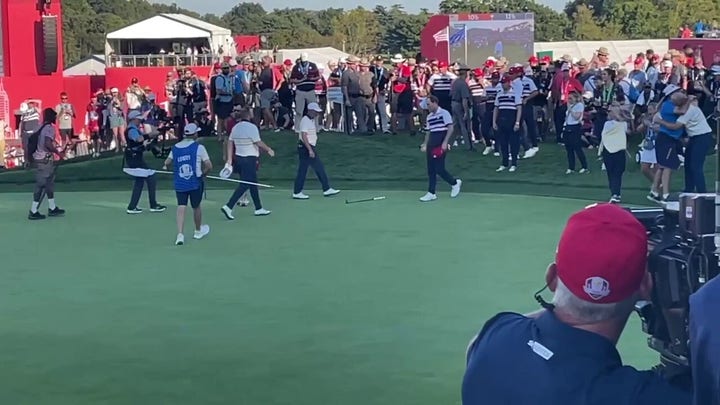 Shane Lowry makes birdie to retain Ryder Cup for Europe