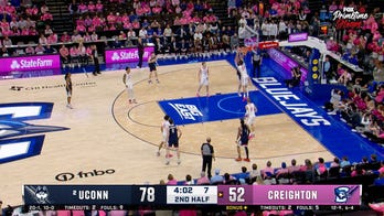 UConn's Alex Karaban sets up Eric Reibe for two-handed flush vs. Creighton