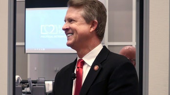 Amid a downpour, GOP sees a rainbow in Kansas