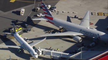 Planes clip wings at Boston's Logan International Airport