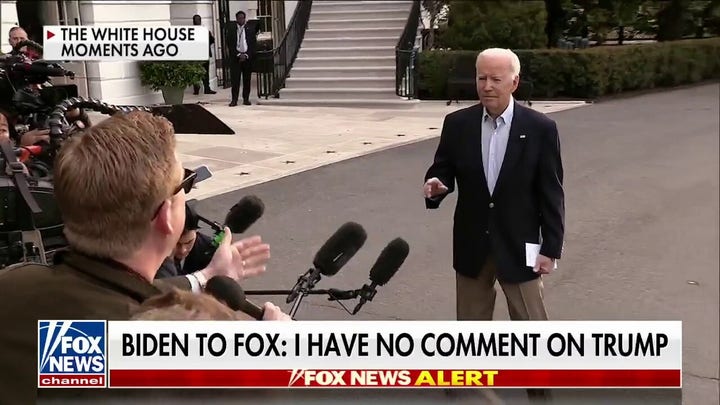 Biden has no comment on Trump indictment, tells Russia to let detained reporter go