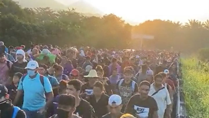 Migrant caravan doubles in size as it travels through Mexico