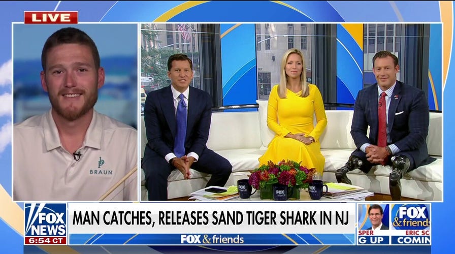 'Shark man' catches tiger shark at New Jersey beach