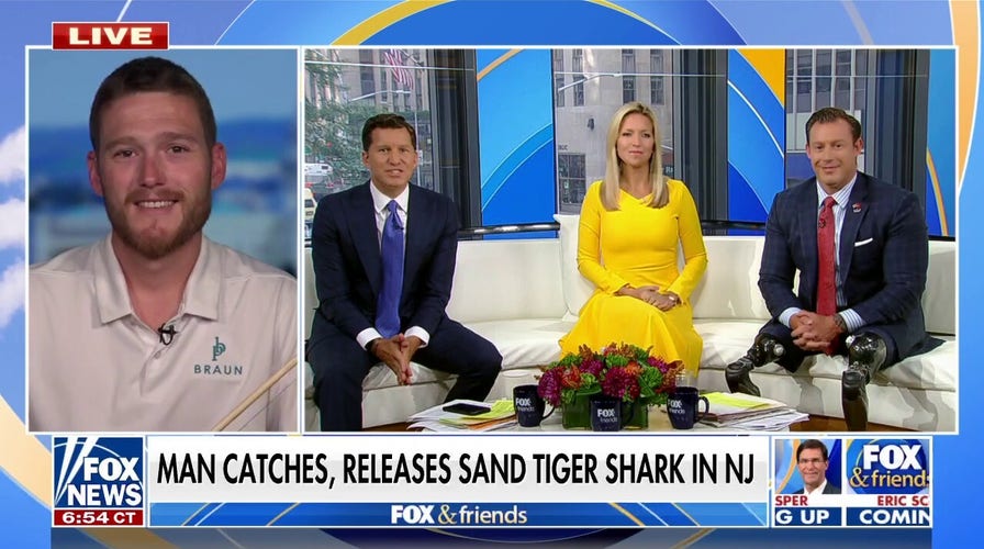 'Shark man' catches tiger shark at New Jersey beach