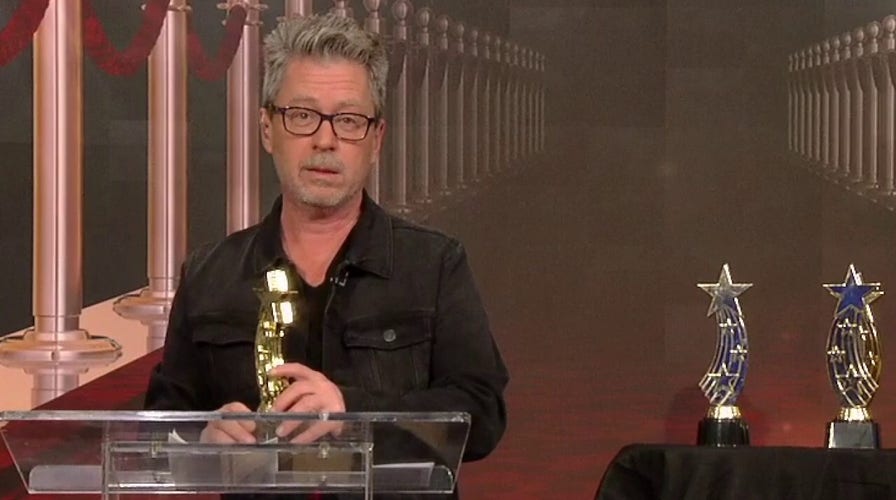 Comedian Michael Loftus presents the impeachment awards